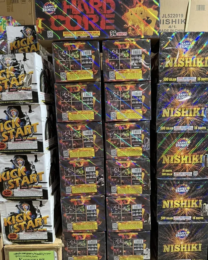 Hard Core, Nishiki, and Kick Start fireworks stacked in the showroom